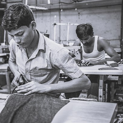 Two men working in the BLNK clothing workshop
