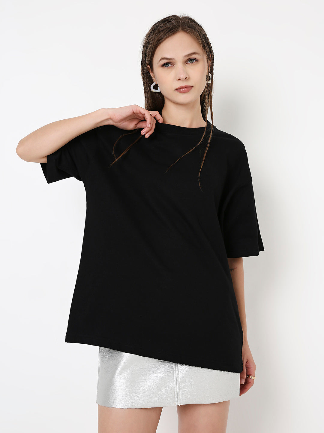 Oversize black solid cotton t-shirt with dropped shoulders and short sleeves.