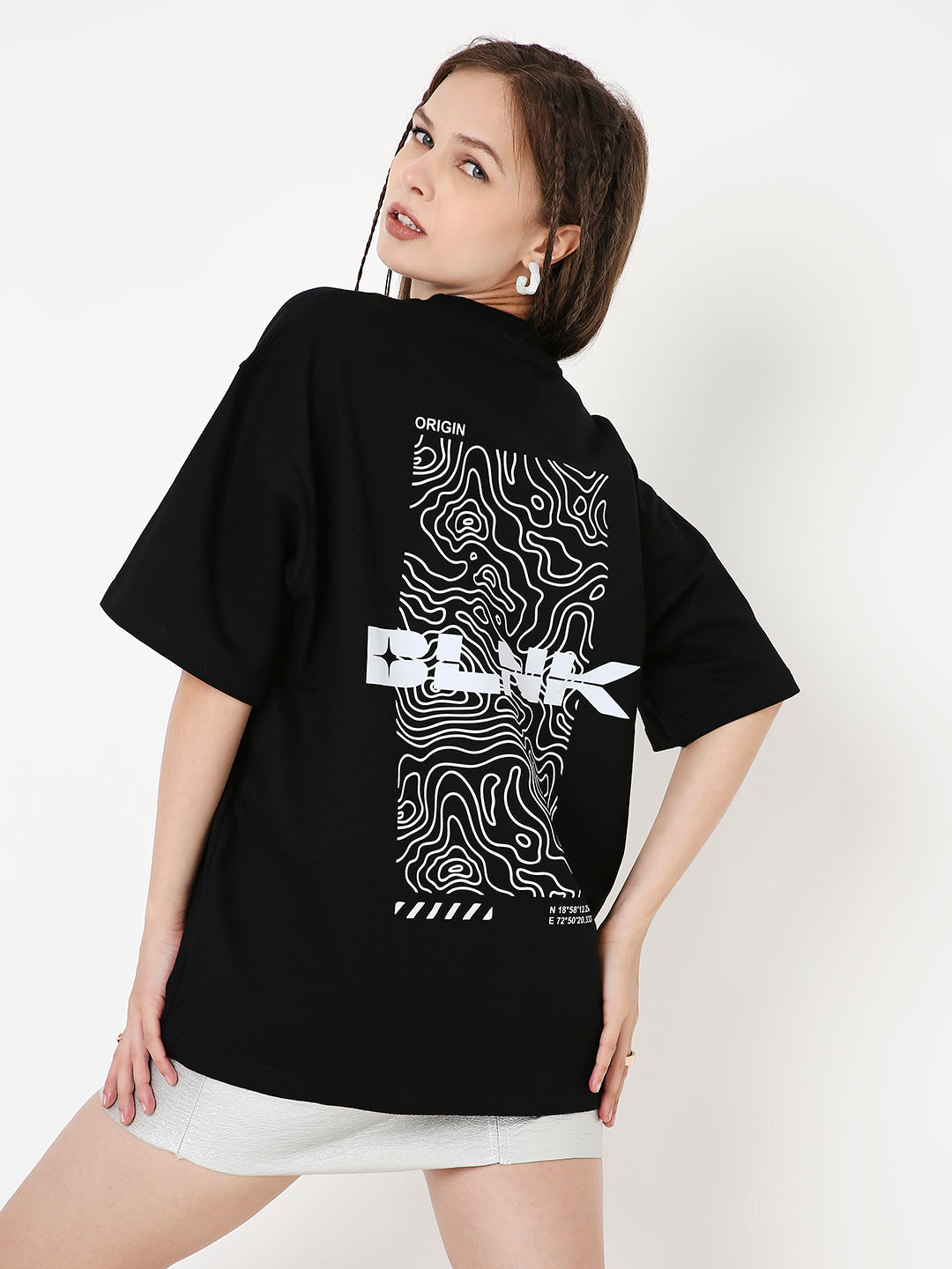Oversize black t-shirt with white abstract topographic print and bold "BLNK" text on back.