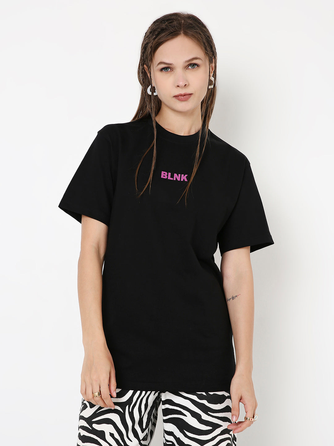 Black relaxed fit t-shirt with small pink and white "BLINK" print on chest.