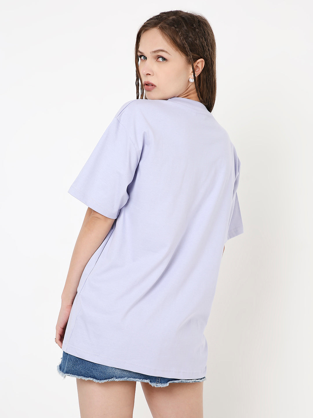Relaxed fit lavender t-shirt with short sleeves and crew neckline, worn with denim shorts.