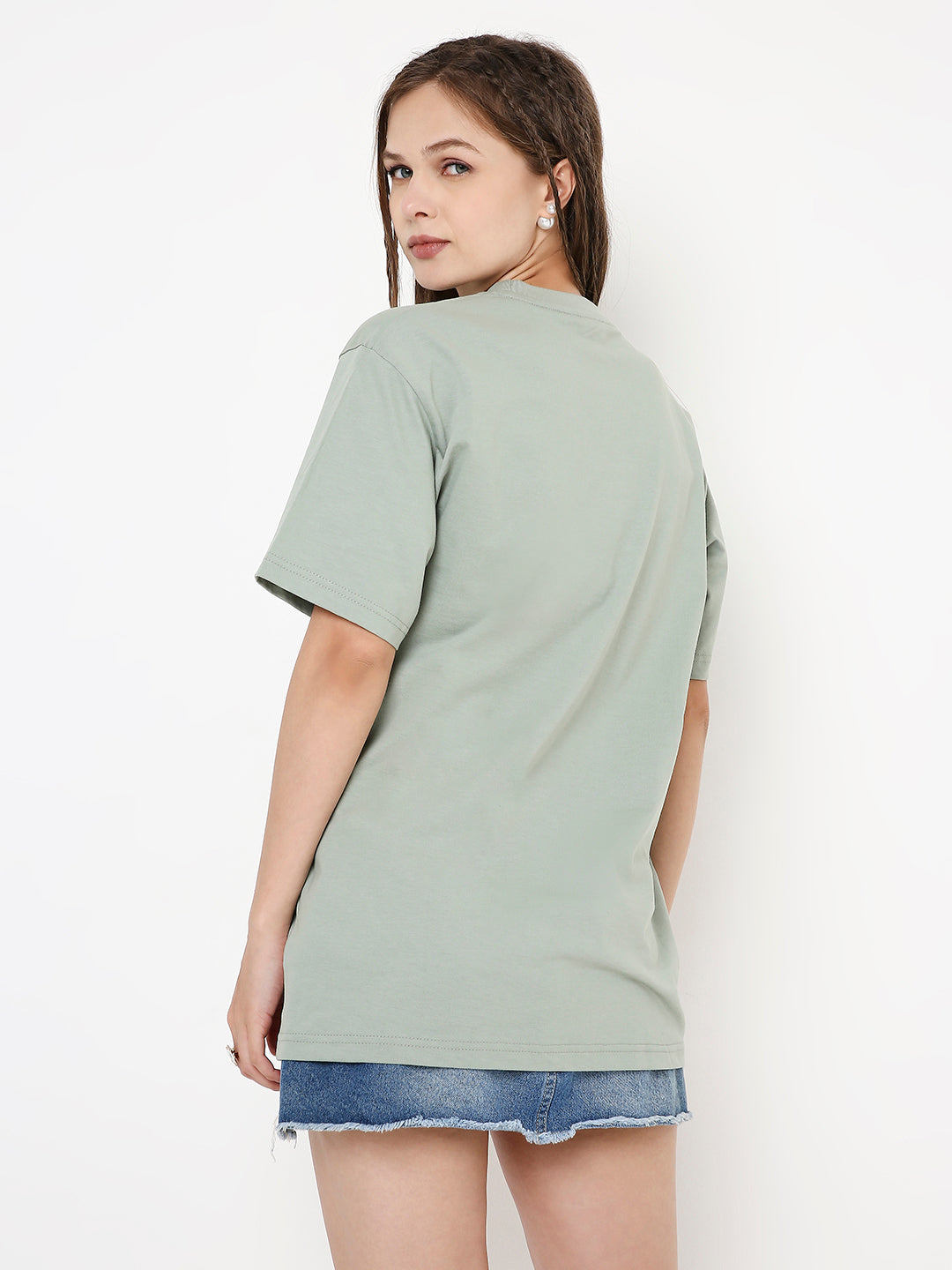 Relaxed fit sage green solid short-sleeve T-shirt on a model viewed from the back.