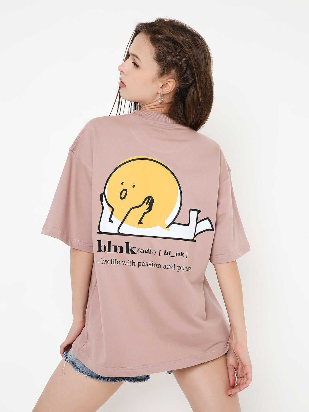 Oversize onion pink t-shirt with cartoon yellow onion graphic and text on the back.