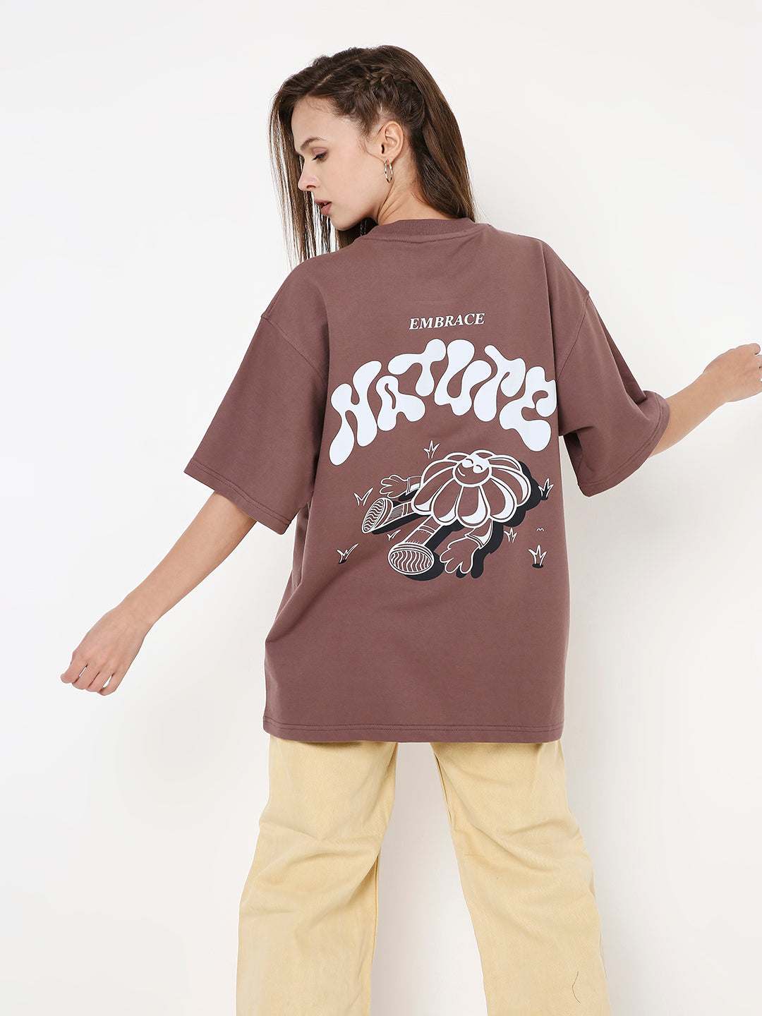 Oversize old rose t-shirt with white graphic floral print and text on the back.
