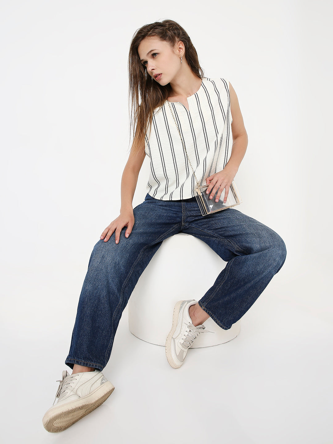 White crop top with vertical lemon-yellow and gray stripes, sleeveless, loose fit.