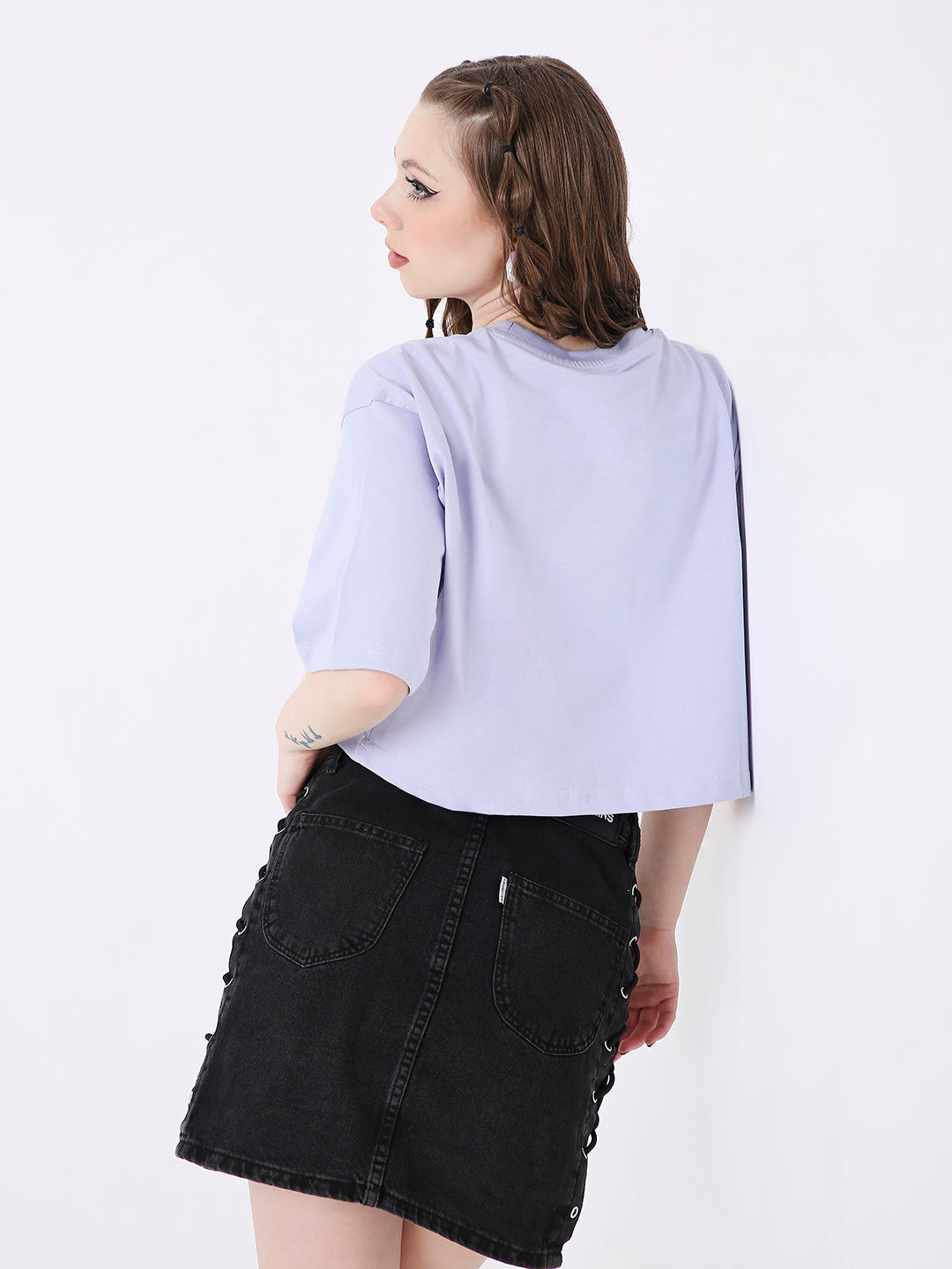Oversize lavender crop top with short sleeves and relaxed fit shown from back.