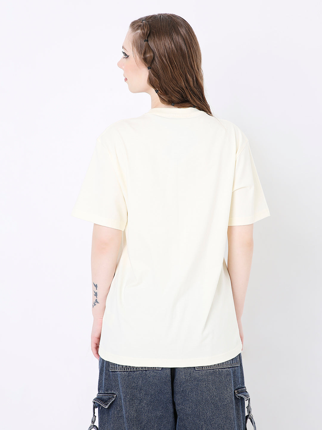 Off-white relaxed fit T-shirt with short sleeves and crew neckline shown from back.