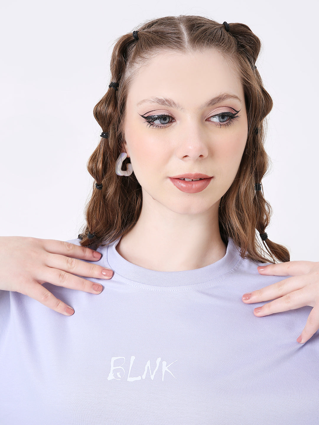 Lavender relaxed fit t-shirt with white embroidered "FLWK" text and crew neckline.