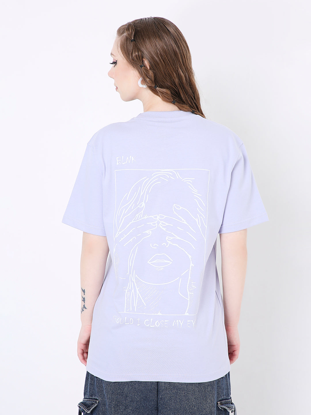 Lavender relaxed fit t-shirt with white abstract face line art on back, short sleeves.