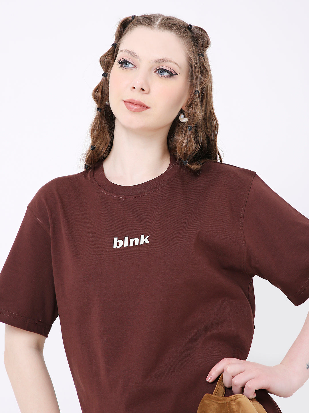 Brown relaxed fit t-shirt with small white "blink" text on front, short sleeves, crew neck.