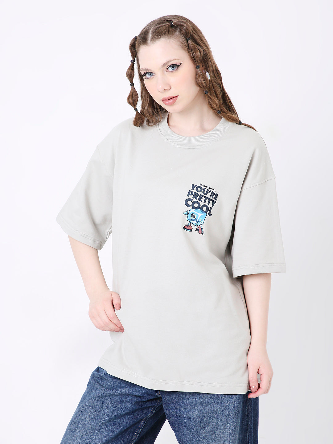 Light gray oversized T-shirt with colorful skipping stone graphic and "You're Too Cool" text on front pocket area.