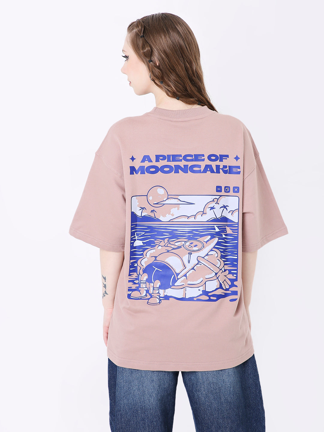 Oversize onion pink T-shirt with blue graphic print and "A Piece of Mooncake" text on back.