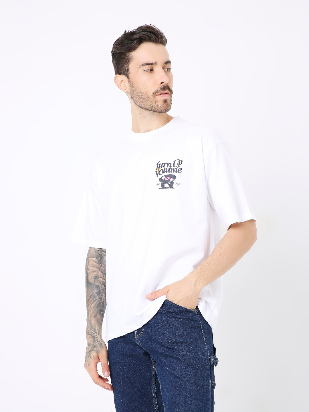Oversize white T-shirt with small black graphic text on left chest, relaxed fit.