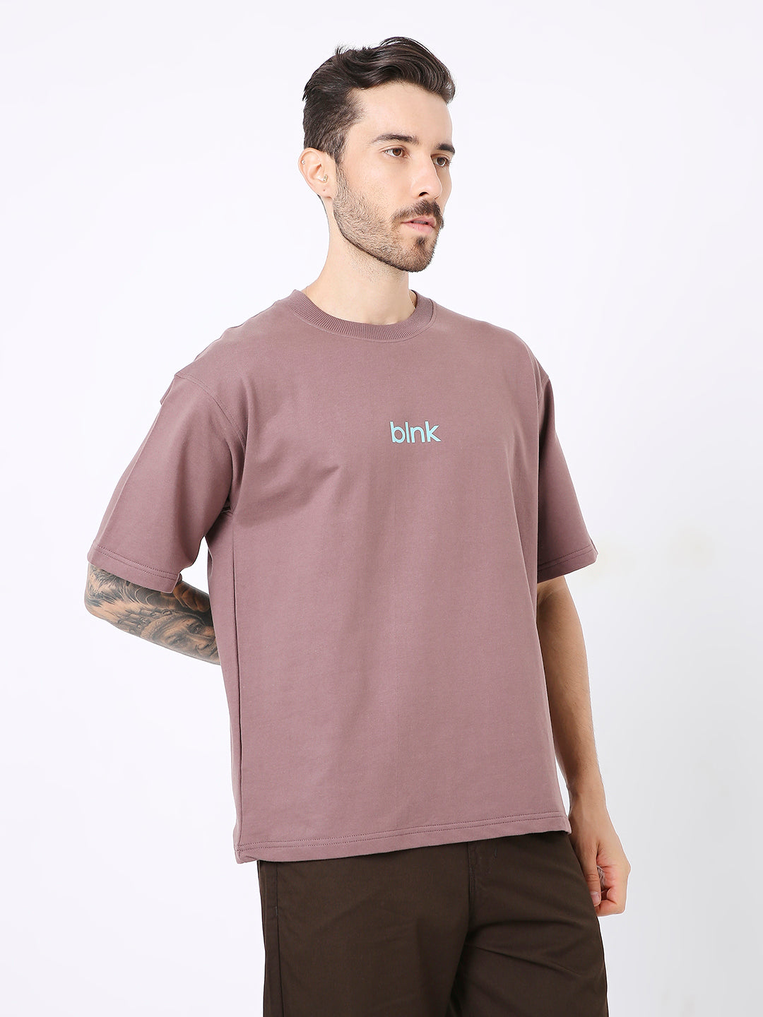 Oversize old rose T-shirt with small blue "bink" text on chest, short sleeves, relaxed fit.