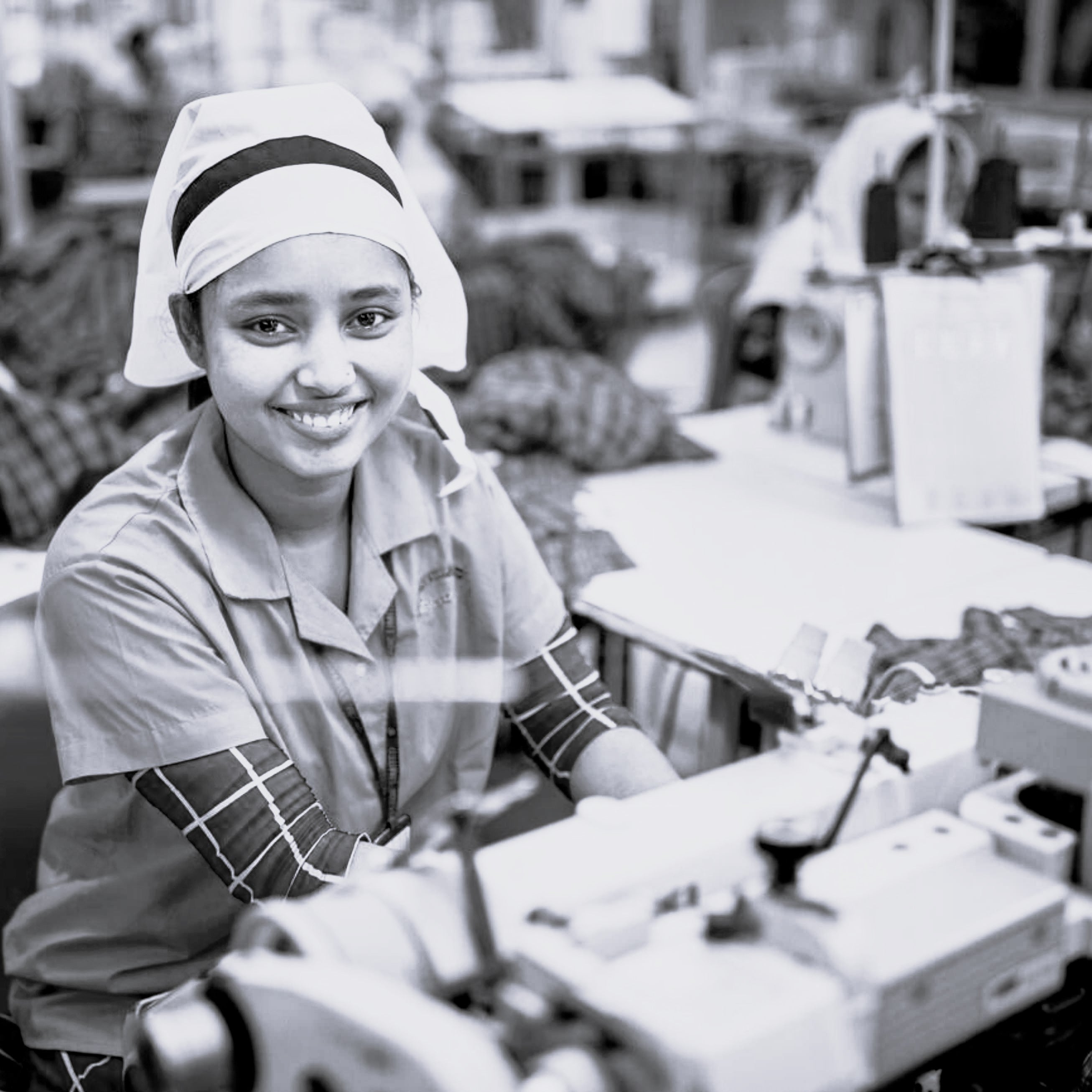 Woman working at a BLNK Store factory.