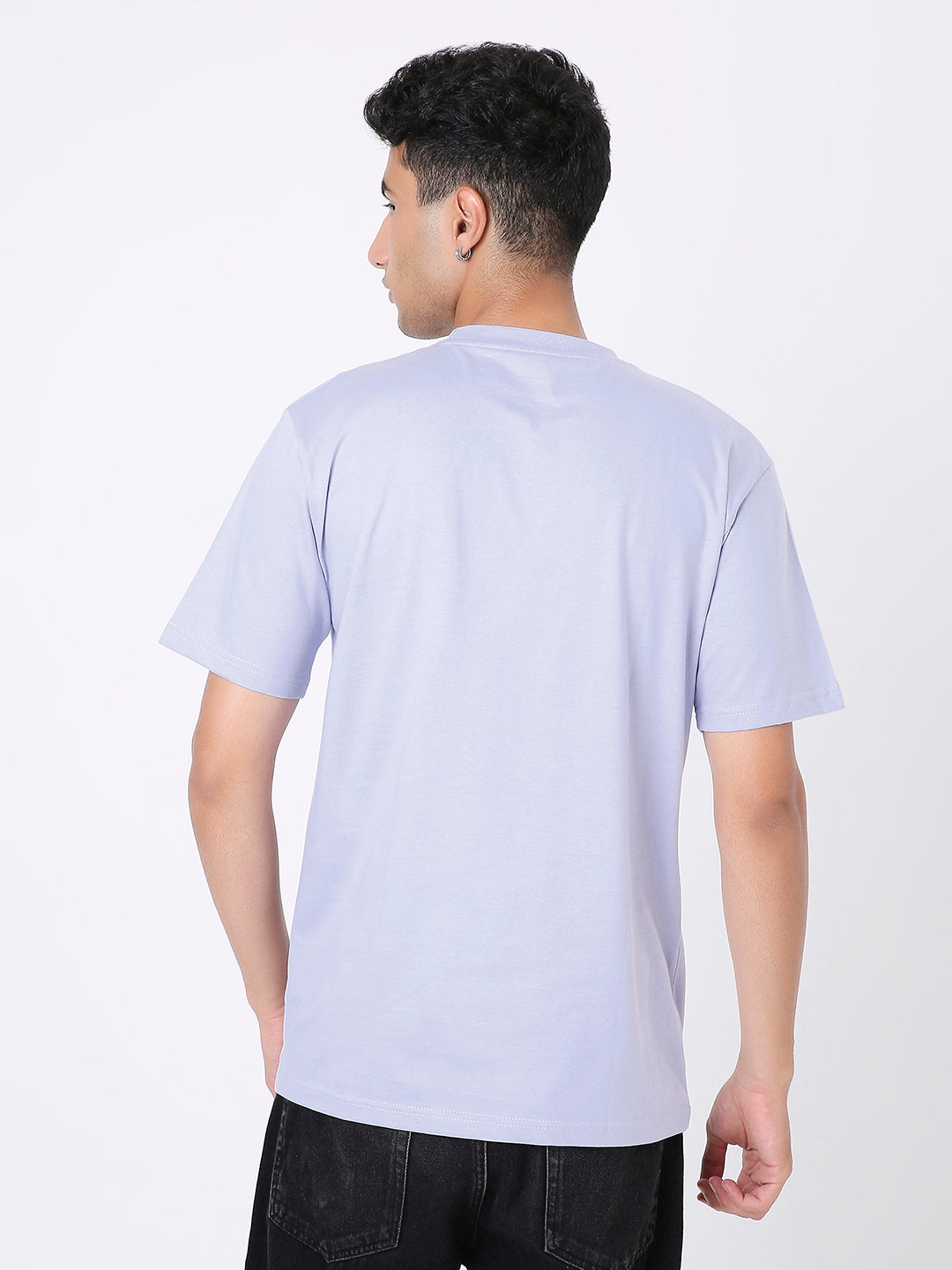 Relaxed fit solid lavender t-shirt with short sleeves, shown from back on a male model.