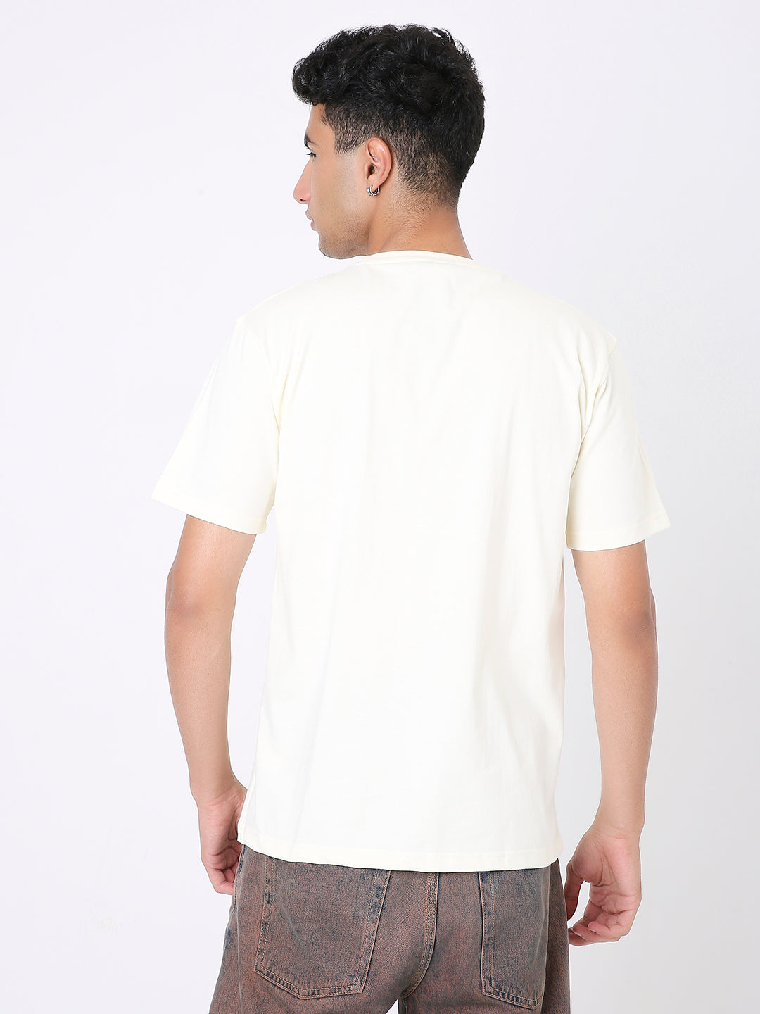 Off-white relaxed fit short-sleeve t-shirt shown from the back on a male model.