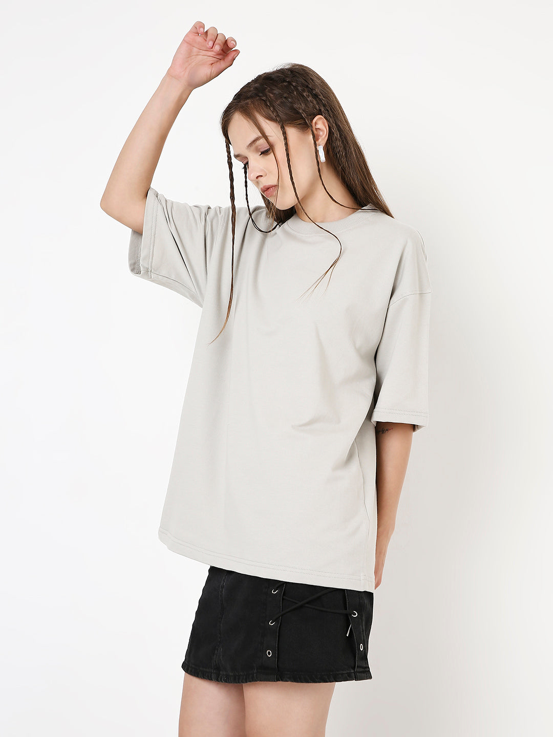 Oversize light gray solid t-shirt with dropped sleeves on a female model.
