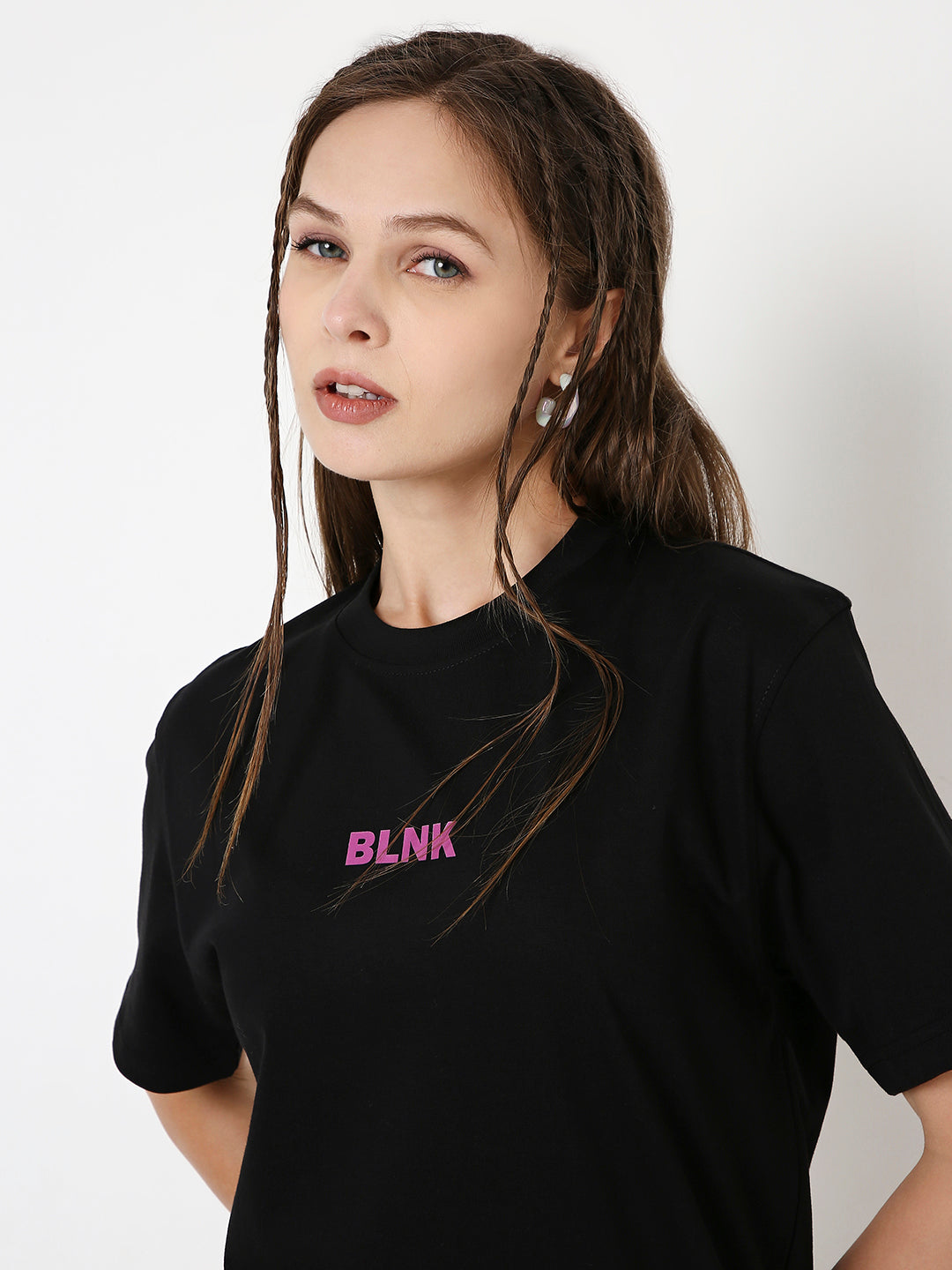 Black relaxed-fit T-shirt with small pink "BLINK" text printed on the chest.